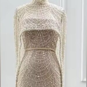 Luxurious Beaded Strapless Gown with Cape